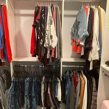 Walk-in closet after organizing — custom systems, clear zones, easy to maintain by Kiera Rain