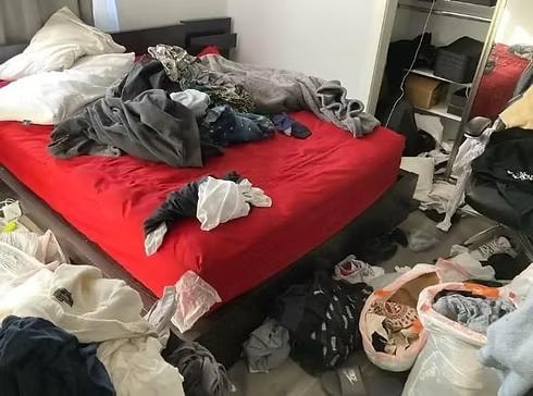 Messy bedroom with clothes covering the floor before organizing by Kiera Rain, Fremont CA