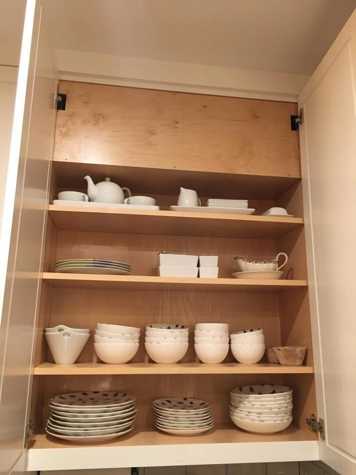 Kitchen cabinet with dishware organized before and after by Bay Area Professional Organizer Kiera Rain, Danville CA